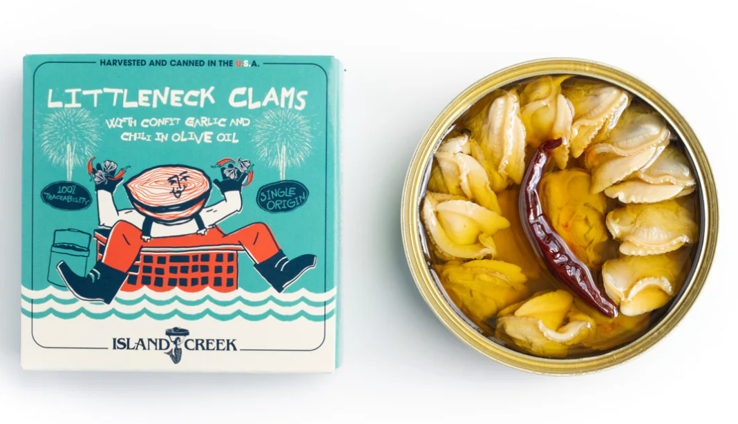 Top-down of littleneck clams tin and teal box labeled Littleneck Clams, opened tin in olive oil with chili on white
